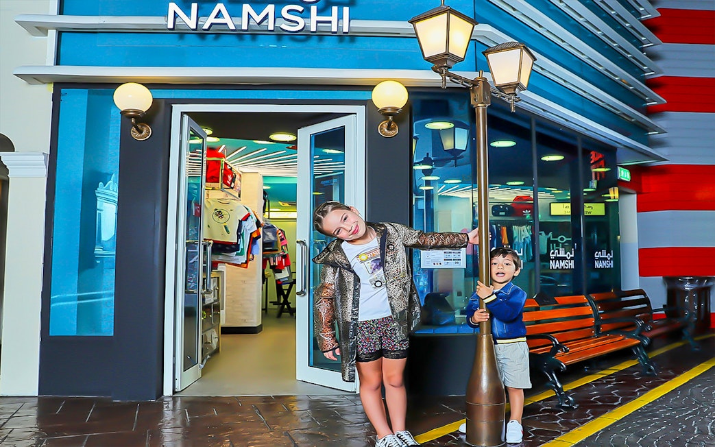 Children playing outside a KidZania shop in Dubai.