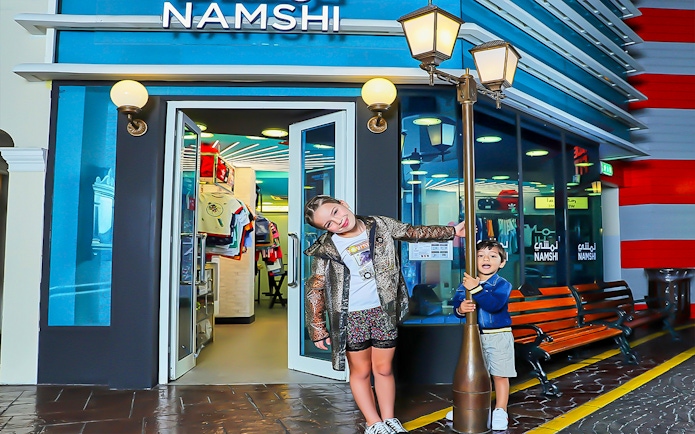 Children playing outside a KidZania shop in Dubai.