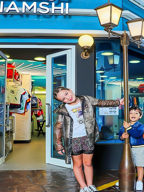 Children playing outside a KidZania shop in Dubai.