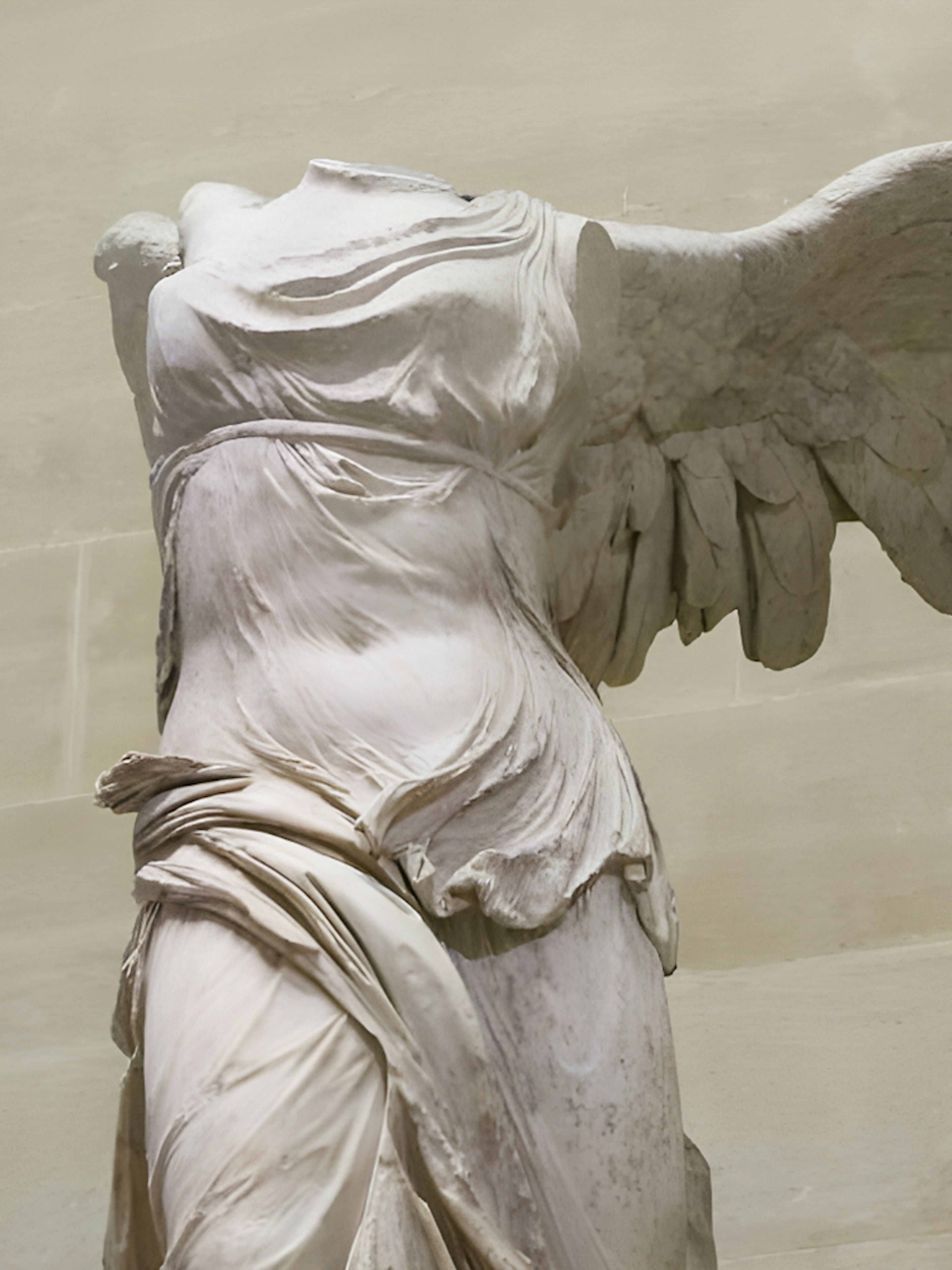 Winged Victory of Samothrace statue at the Louvre Museum, Paris.