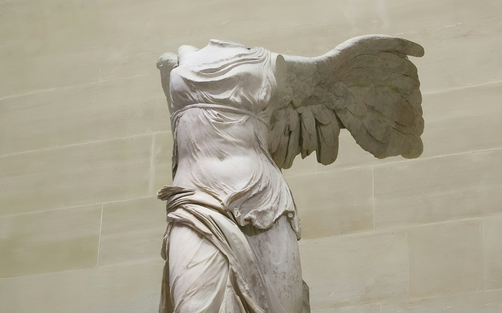 Winged Victory of Samothrace statue at the Louvre Museum, Paris.