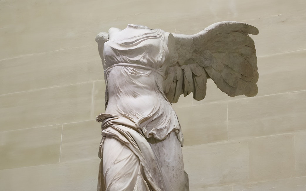 Winged Victory of Samothrace statue at the Louvre Museum, Paris.