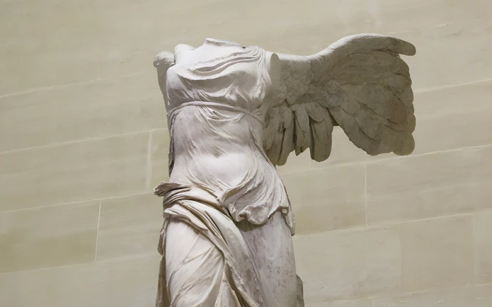 Winged Victory of Samothrace statue at the Louvre Museum, Paris.