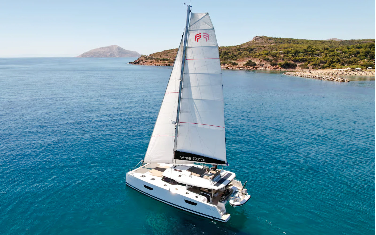 Mykonos: Catamaran Cruise to Rhenia with Meal, Drinks and Hotel Transfers
