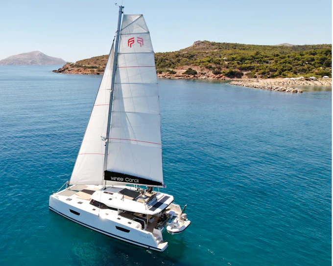 Mykonos: Catamaran Cruise to Rhenia with Meal, Drinks and Hotel Transfers
