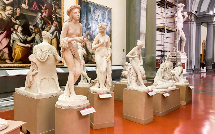 Marble sculptures in Florence's Accademia Gallery, part of the City Sightseeing tour.