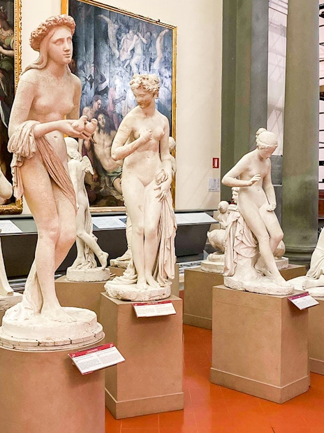Marble sculptures in Florence's Accademia Gallery, part of the City Sightseeing tour.