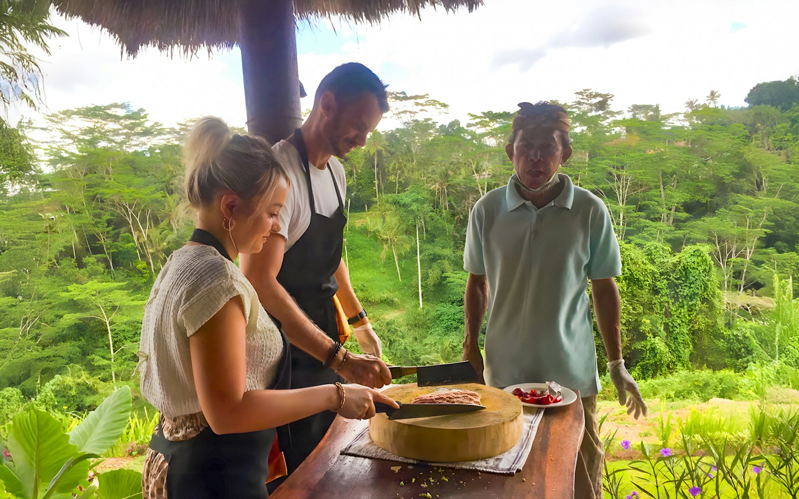 Chef alongside participants in Bali cooking class