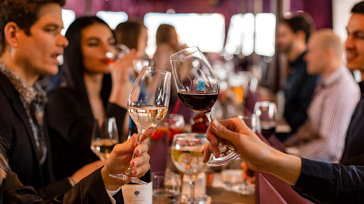 Couple cheering wine glass