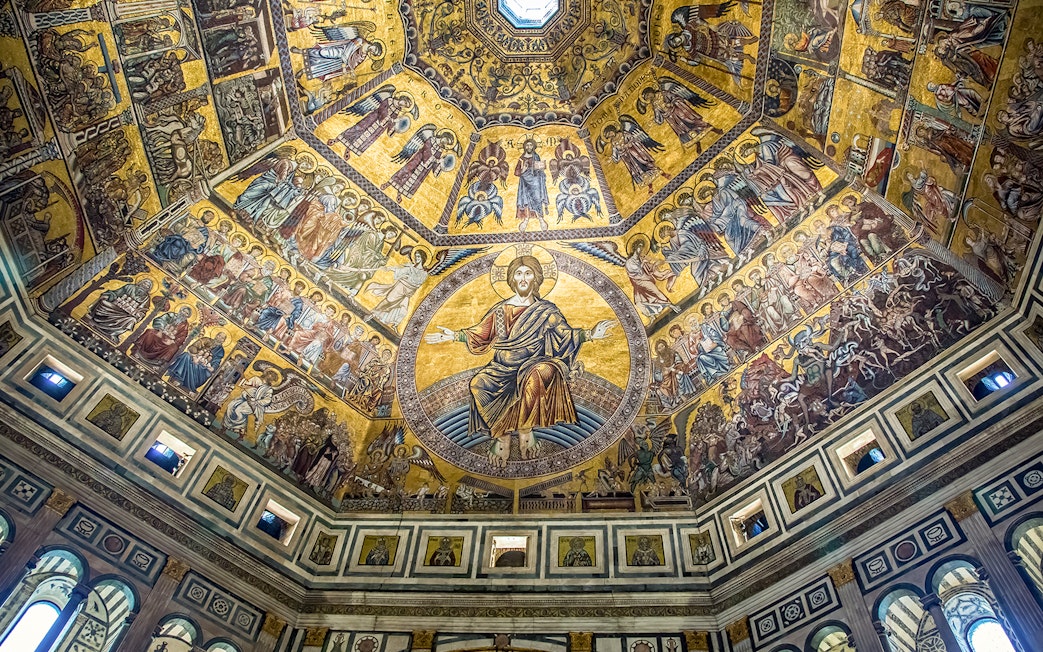 Florence Cathedral dome interior with detailed mosaics and religious figures.