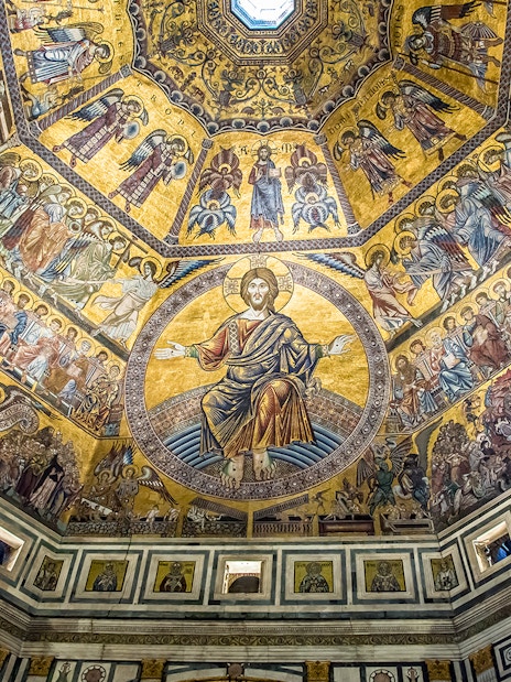 Florence Cathedral dome interior with detailed mosaics and religious figures.