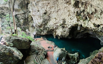 Los Tres Ojos cave with turquoise water and rocky formations in Santo Domingo.