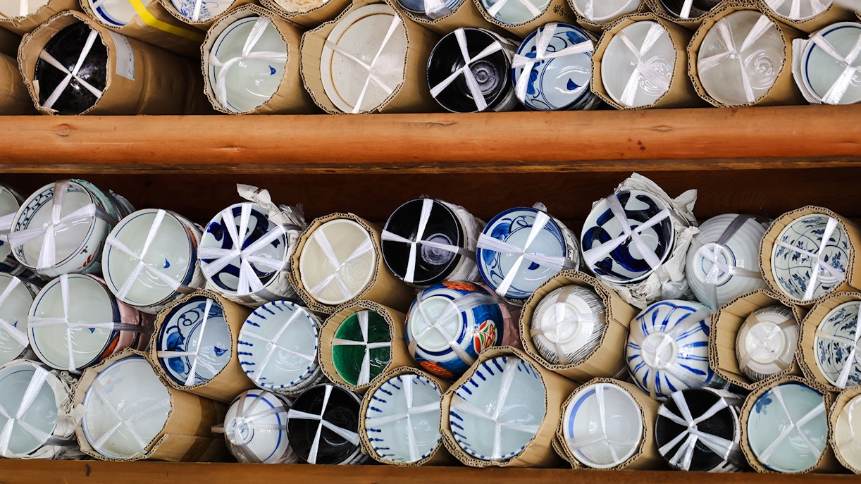 Ceramic bowls wrapped in cardboard at Kappabashi Kitchen Tools Street, Tokyo.