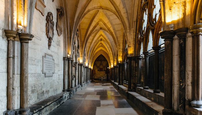 Gothic corridor inside Westminster Abbey, part of the exclusive Houses of Parliament tour.