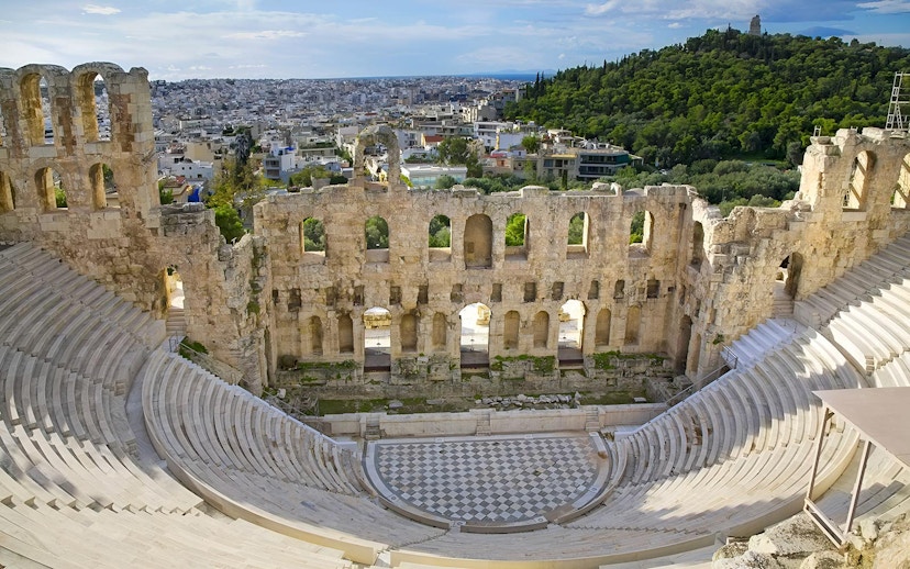 Odeon of Herodes Atticus amphitheater with cityscape view, Athens, Greece.