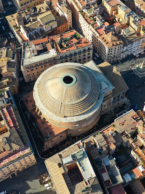 Aerial view of the Roman Pantheon in Rome, Italy, surrounded by historic buildings.