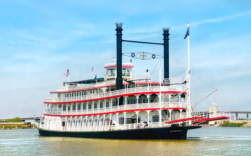 Riverboat City of New Orleans cruising on the Mississippi River.