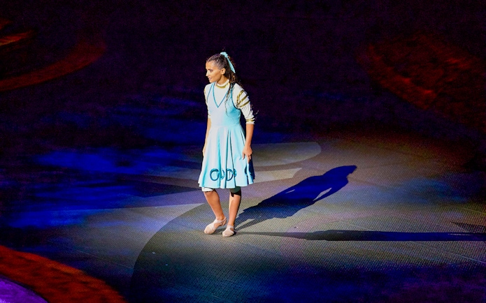 Performer on stage at La Perle by Dragone show in Dubai.