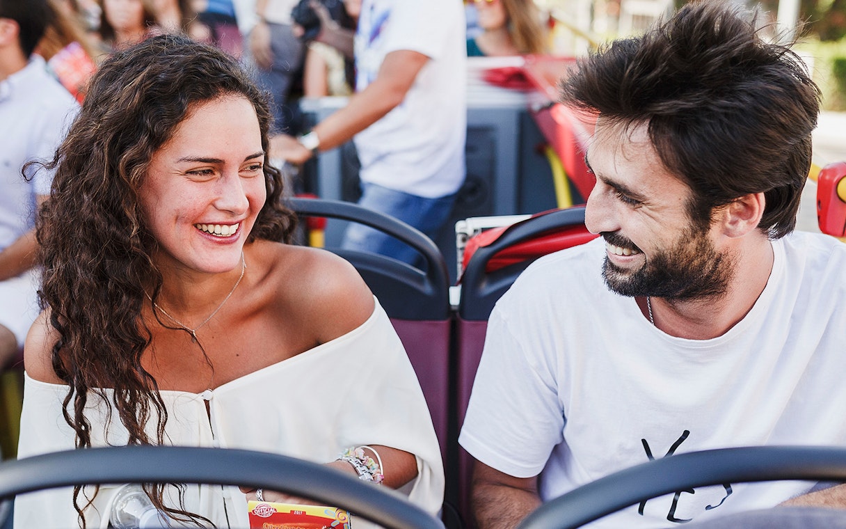 Couple enjoying Chester Hop-On Hop-Off bus tour.