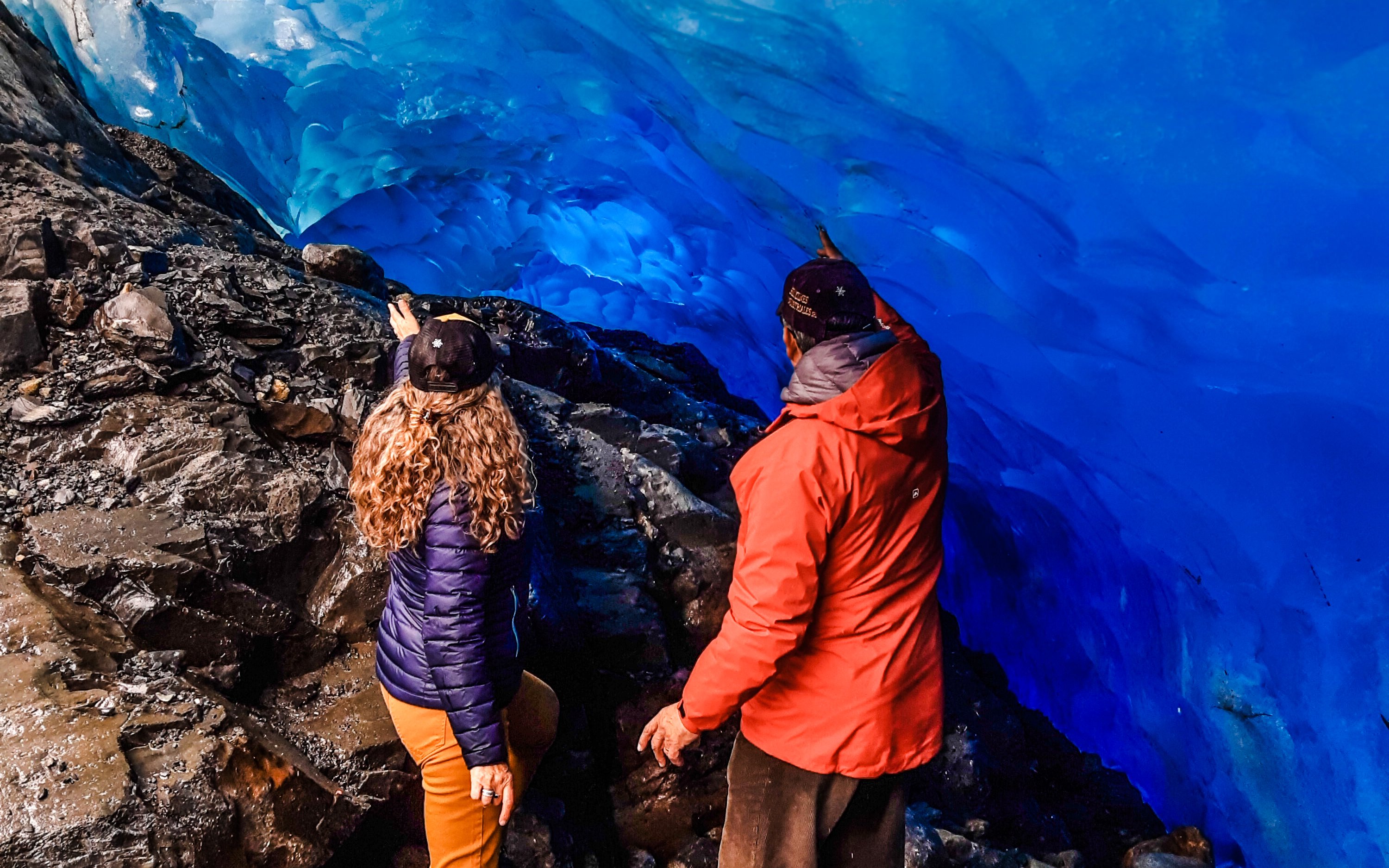 Guests exploring Perito Moreno Glacier wall on guided Azul tour.