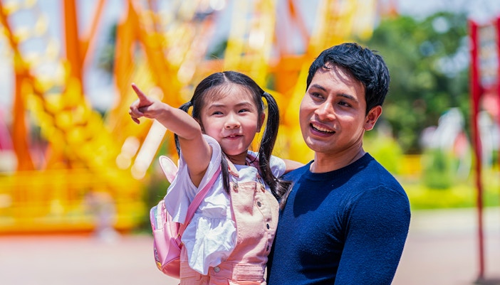 happy child with parent at kidzania dubai theme park