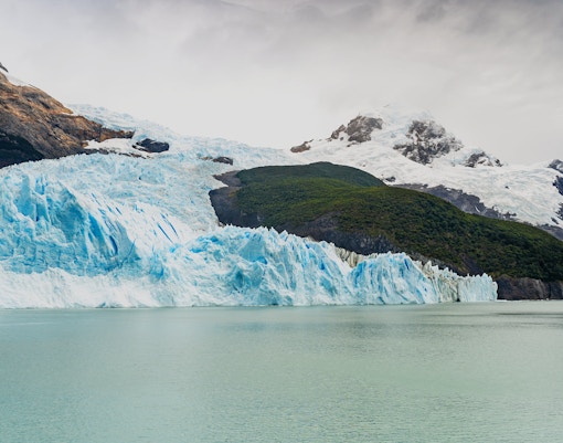 Spegazzini Glacier meeting the water with Peineta and Heim glaciers in the background, Argentina.