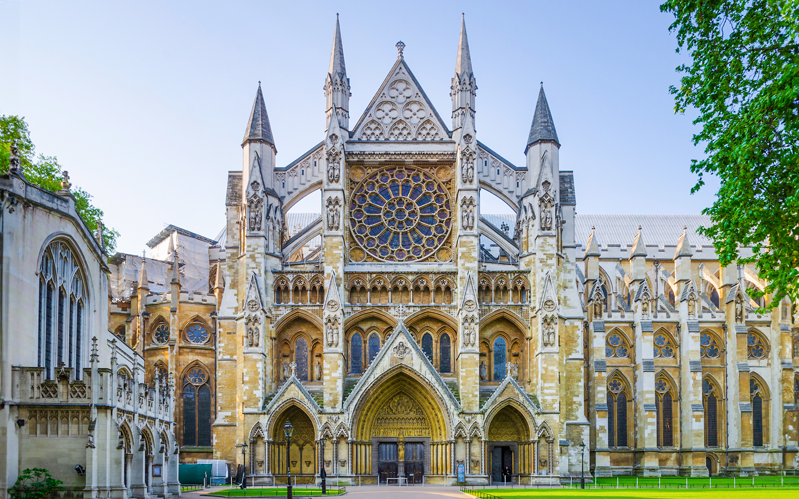 Westminster Abbey facade in London, featuring intricate Gothic architecture.