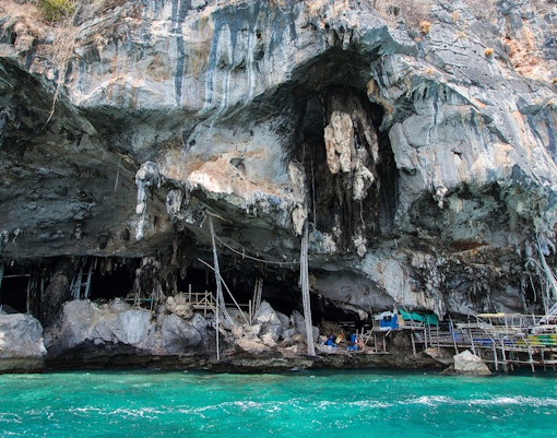 Viking Cave cliffside cavern with ancient paintings and swiftlet bird nests, Thailand.
