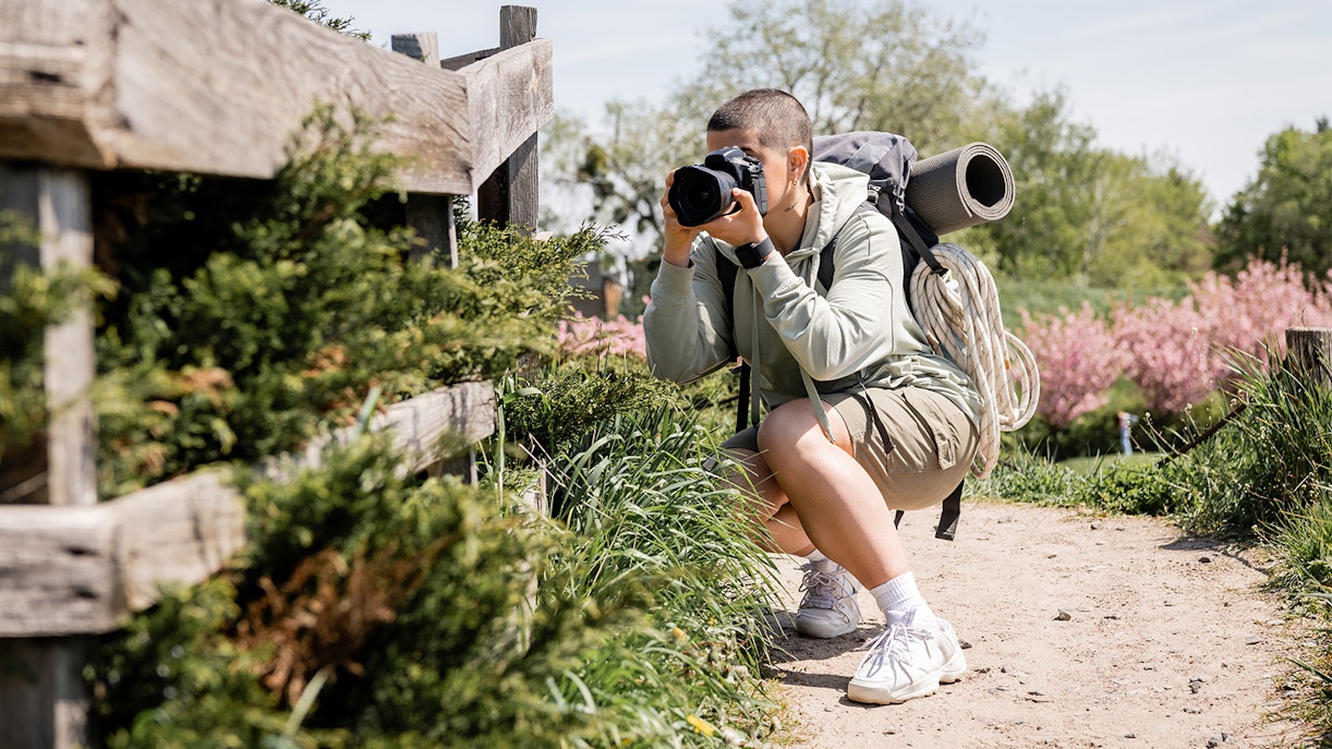 Visitors exploring the Blue Planet Aquarium's vibrant marine life exhibits.