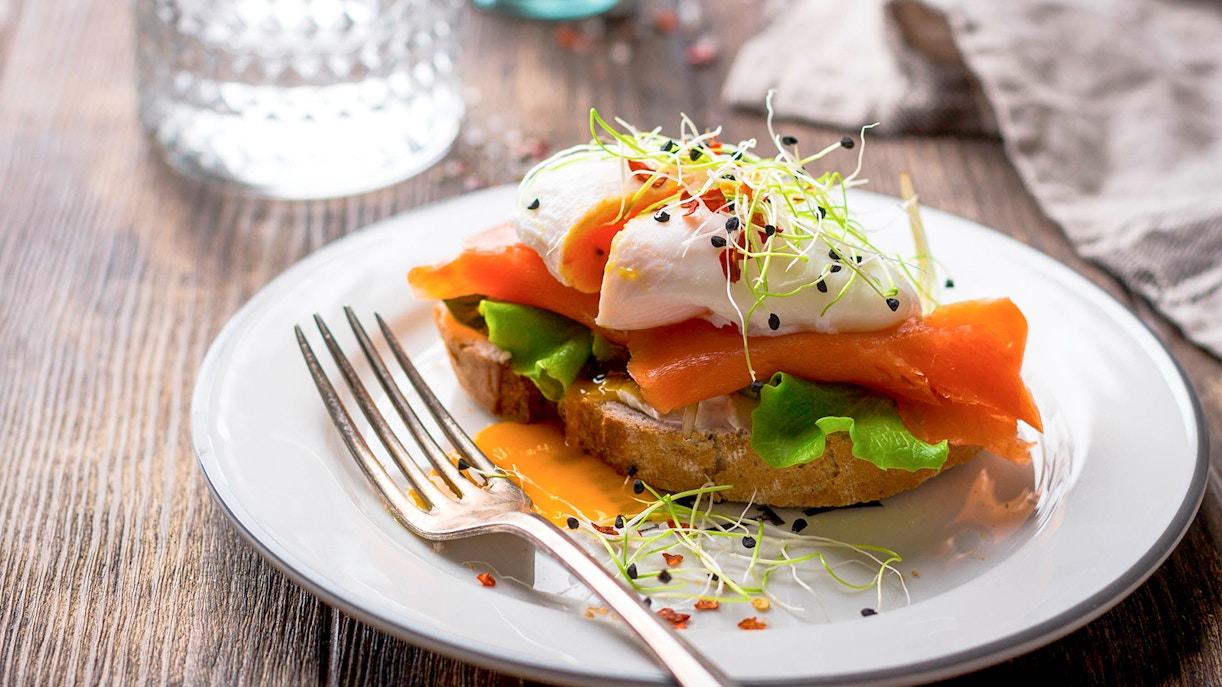 A salmon and Poached Egg breakfast sandwich
