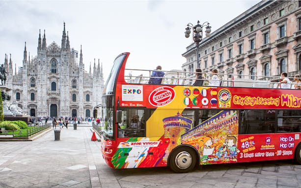 City Sightseeing bus near Duomo di Milano in Milan, Italy.