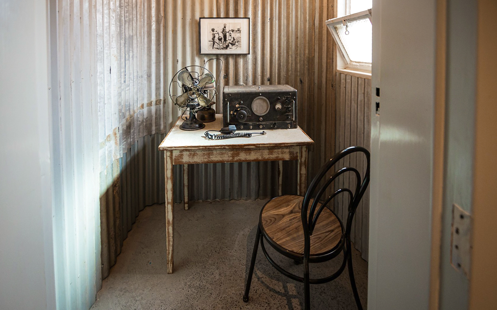 Vintage radio equipment on a table at Alice Springs Royal Flying Doctor Service.