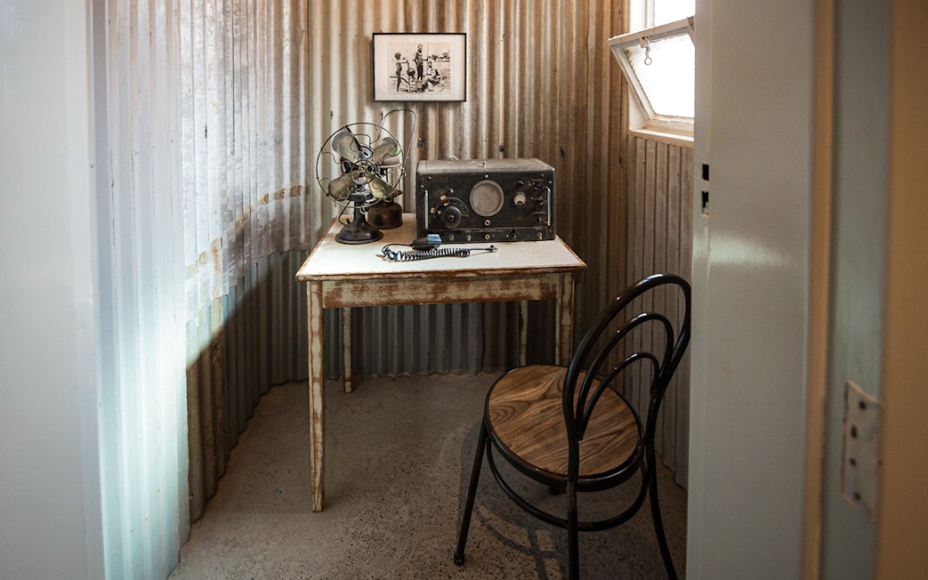 Vintage radio equipment on a table at Alice Springs Royal Flying Doctor Service.