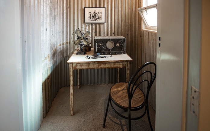 Vintage radio equipment on a table at Alice Springs Royal Flying Doctor Service.