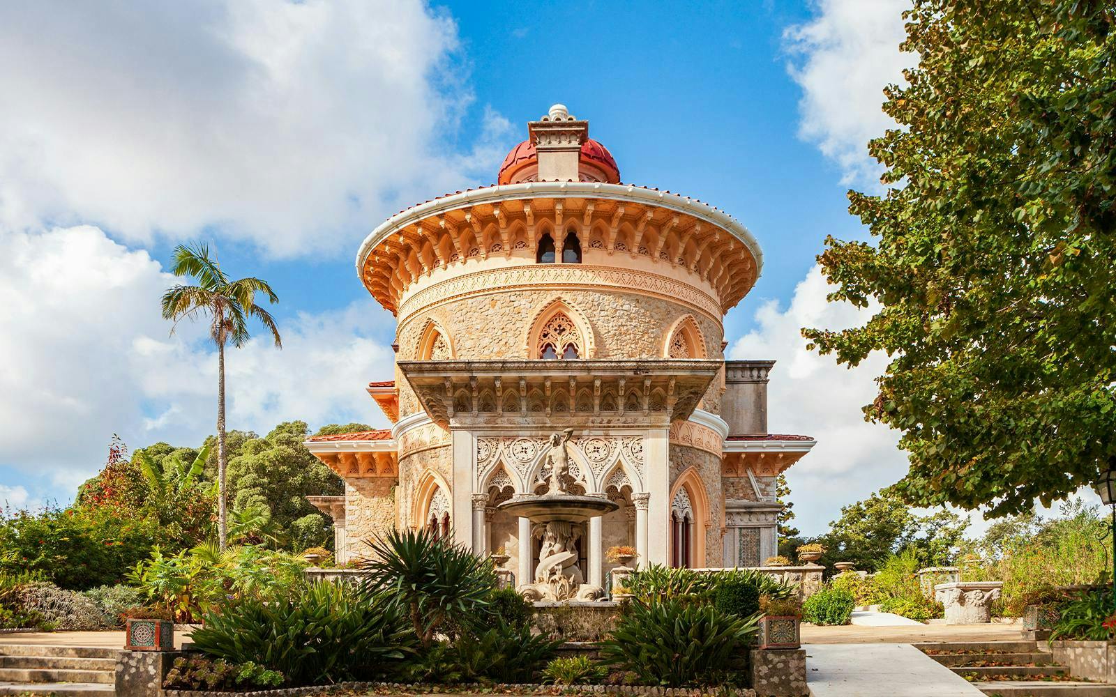 Monserrate Palace in Sintra, Portugal, with ornate architecture and lush gardens.