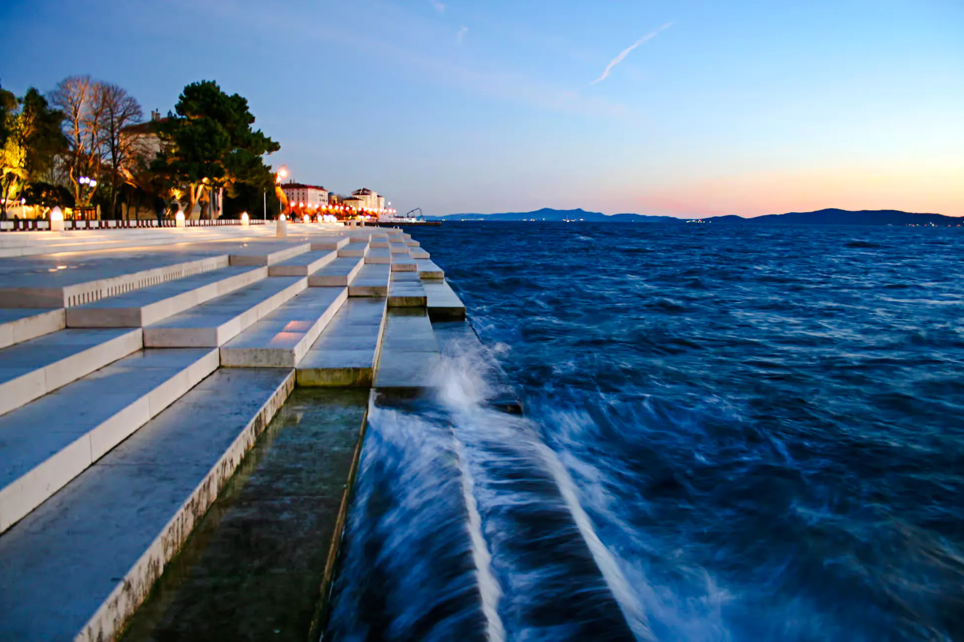 Sea Organ steps by the Adriatic Sea at sunset in Zadar, Croatia.