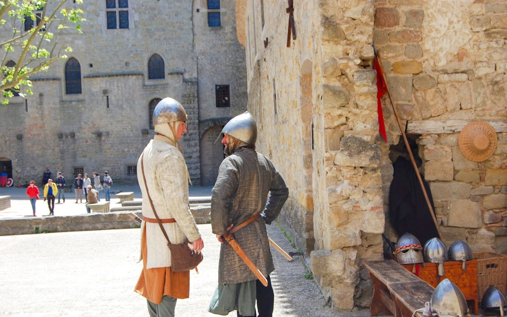 People in knights costume at medieval Carcassonne, France.