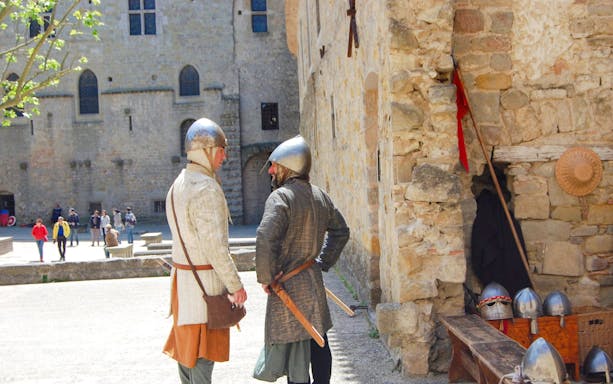 People in knights costume at medieval Carcassonne, France.