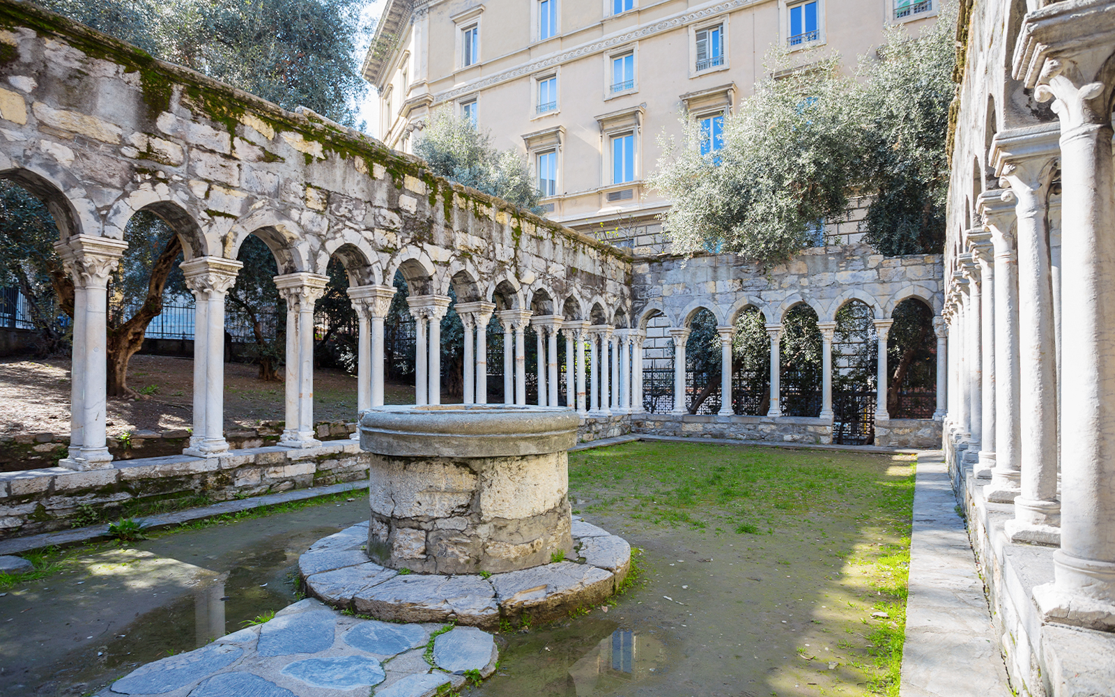Courtyard with stone arches at Casa di Colombo, Genoa, Italy.