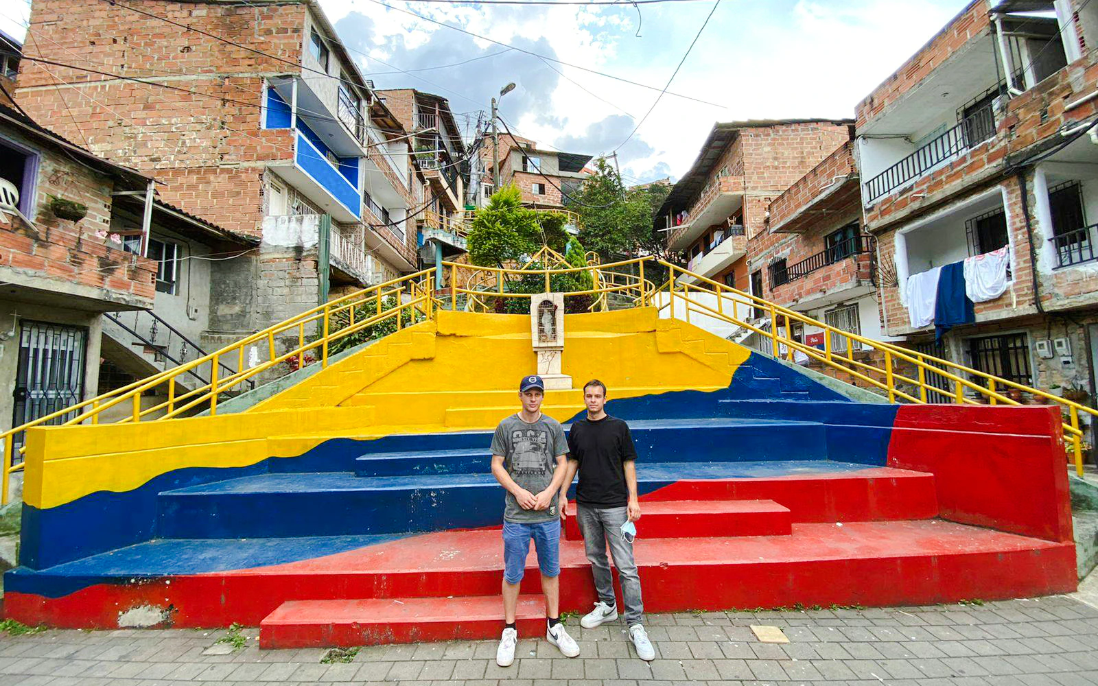 Colorful staircases and urban landscape of Comuna 13, Medellín, Colombia.