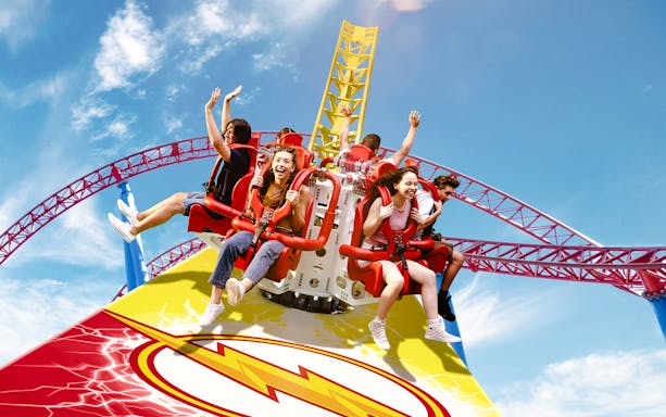 Visitors enjoying a roller coaster ride at Warner Bros Movie World, Gold Coast.