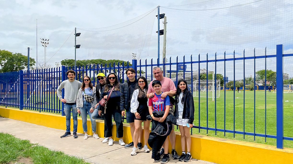 Tourist taking photos outside La Bombonera stadium in Buenos Aires, Argentina.