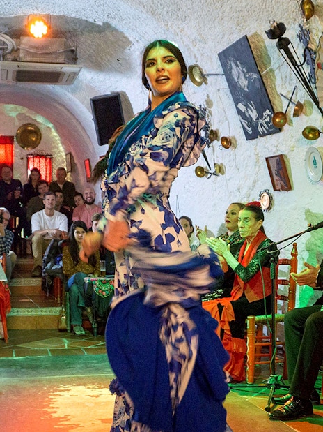 Flamenco dancer performing for visitors at Flamenco Cuevas Los Tarantos, Granada.