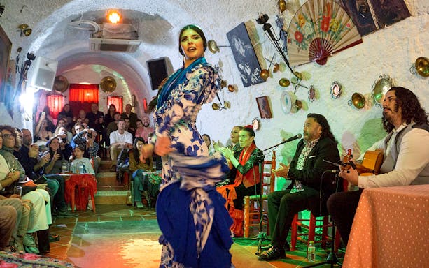 Flamenco dancer performing for visitors at Flamenco Cuevas Los Tarantos, Granada.