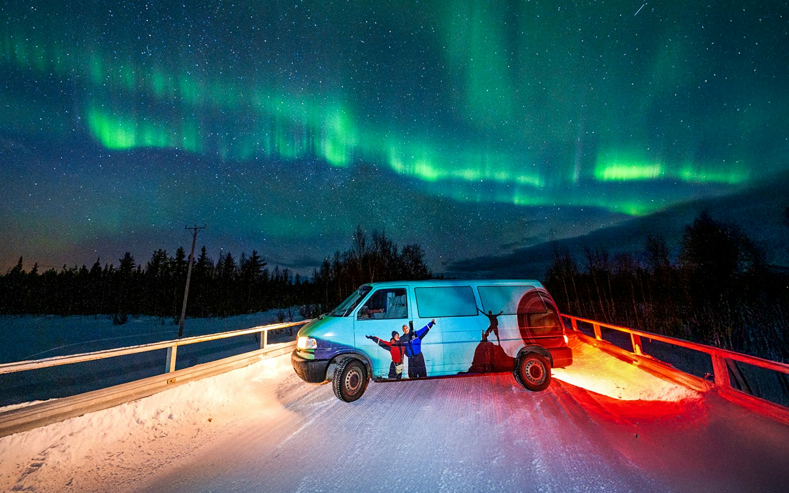 Van parked under Northern Lights during Northern Lights Camp Visit with Barbecue.