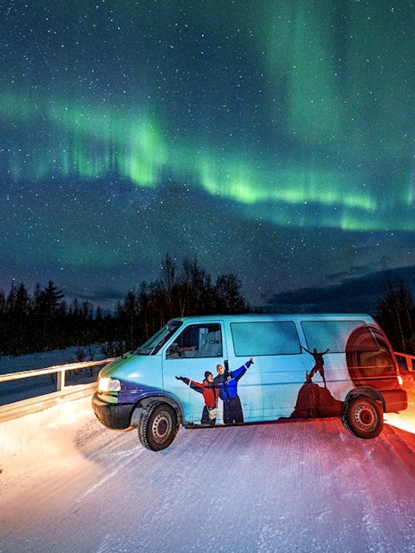 Van parked under Northern Lights during Northern Lights Camp Visit with Barbecue.