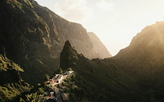 Masca Village nestled in mountainous landscape at sunset, Tenerife.