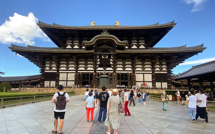 Tourists photographing Todai-ji Temple in Nara, Kyoto.