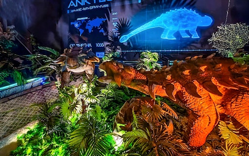 Dinosaurs exhibit with holographic display at Dinosaur Encounter World, Perak.