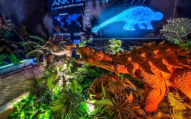 Dinosaurs exhibit with holographic display at Dinosaur Encounter World, Perak.